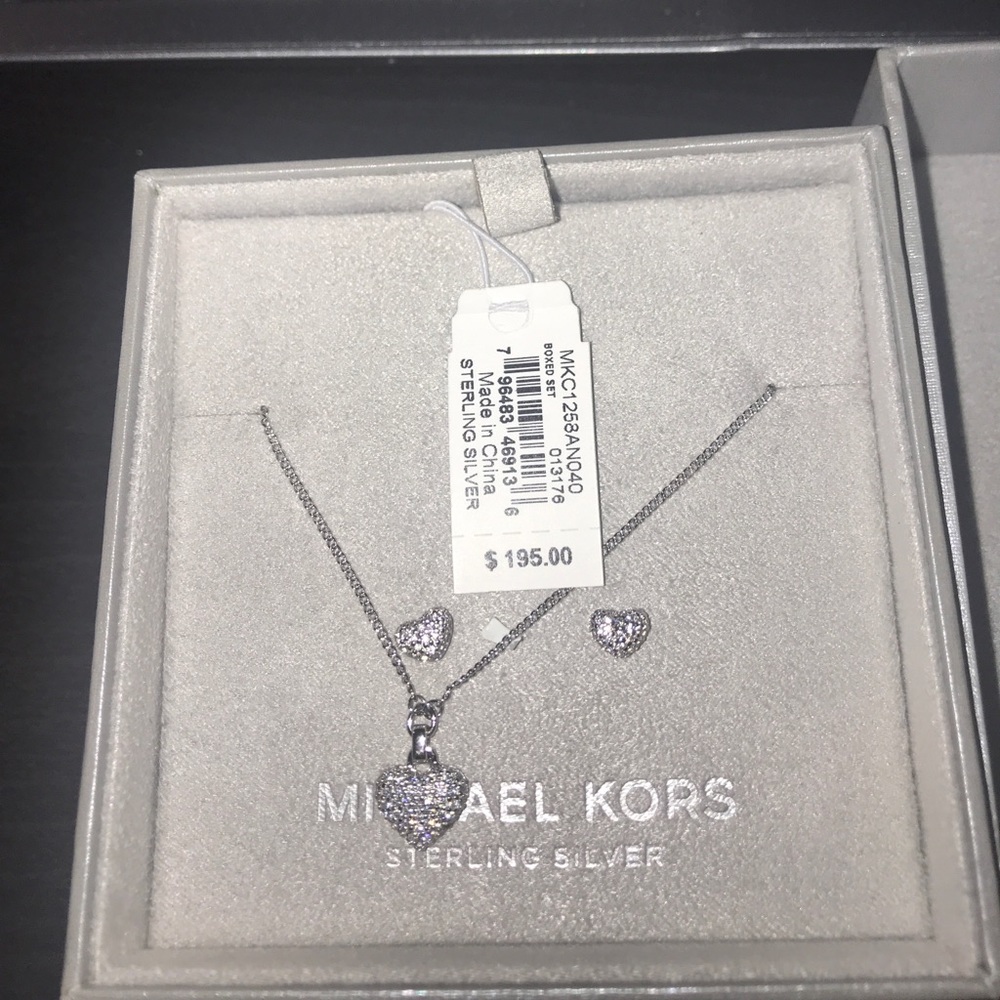 Micheal kros heart earrings  Sterling silver